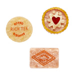 A Biscuit or Three Mini Brooch Set